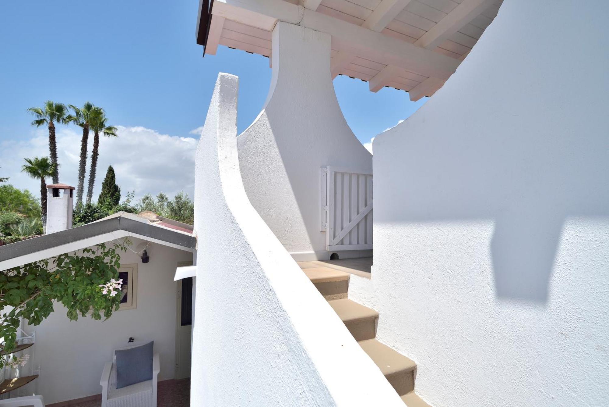 Appartement Romantic House Porto Ulisse à Santa Maria Del Focallo Chambre photo